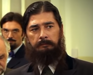 direktor Đura Kozarac (Vojin Ćetković)